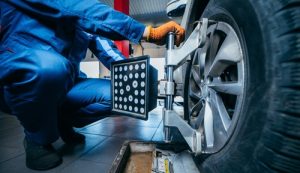Auto,Mechanic,Installing,Sensor,During,Suspension,Adjustment,And,Automobile,Wheel - Auto Repair in York, PA Wheel Bearings | Meineke Car Care | Hanover, PA