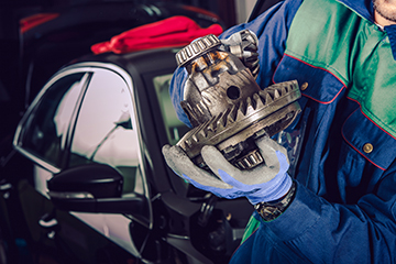 Caucasian,Car,Mechanic,In,His,30s,With,Part,Of,Car - Auto Repair in York, PA Meineke Car Care Auto Service Auto Repair - Auto Repair in York, PA