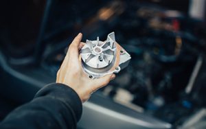 New,Car,Water,Pump,In,Hand,Of,Auto,Mechanic - Auto Repair in York, PA Meineke Car Care Auto Service Auto Repair - Auto Repair in York, PA